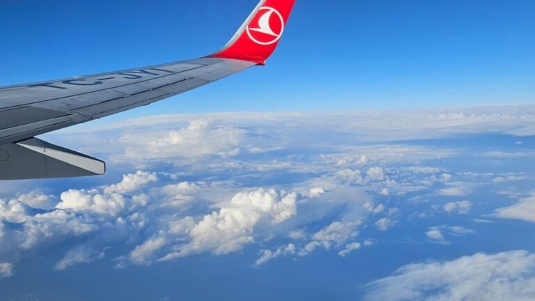 Airplane wing above the clouds, best budget airlines in Europe
