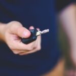 Car rental complaints: close-up of a car key held in a hand