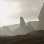 Travel destinations in Scotland: misty view of the Old Man of Storr on the Isle of Skye